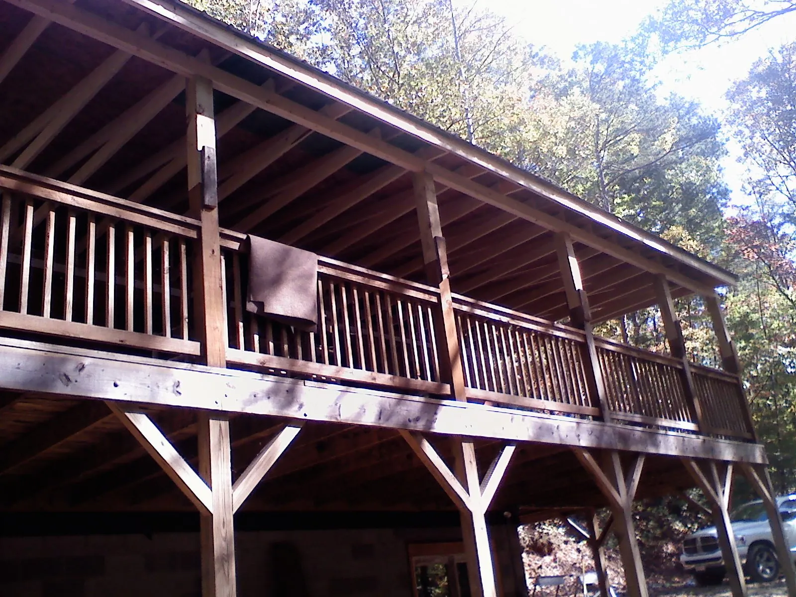 Timber framing under a new elevated porch and deck — Roof Leak Repair in Bayard by Roofing Brothers
